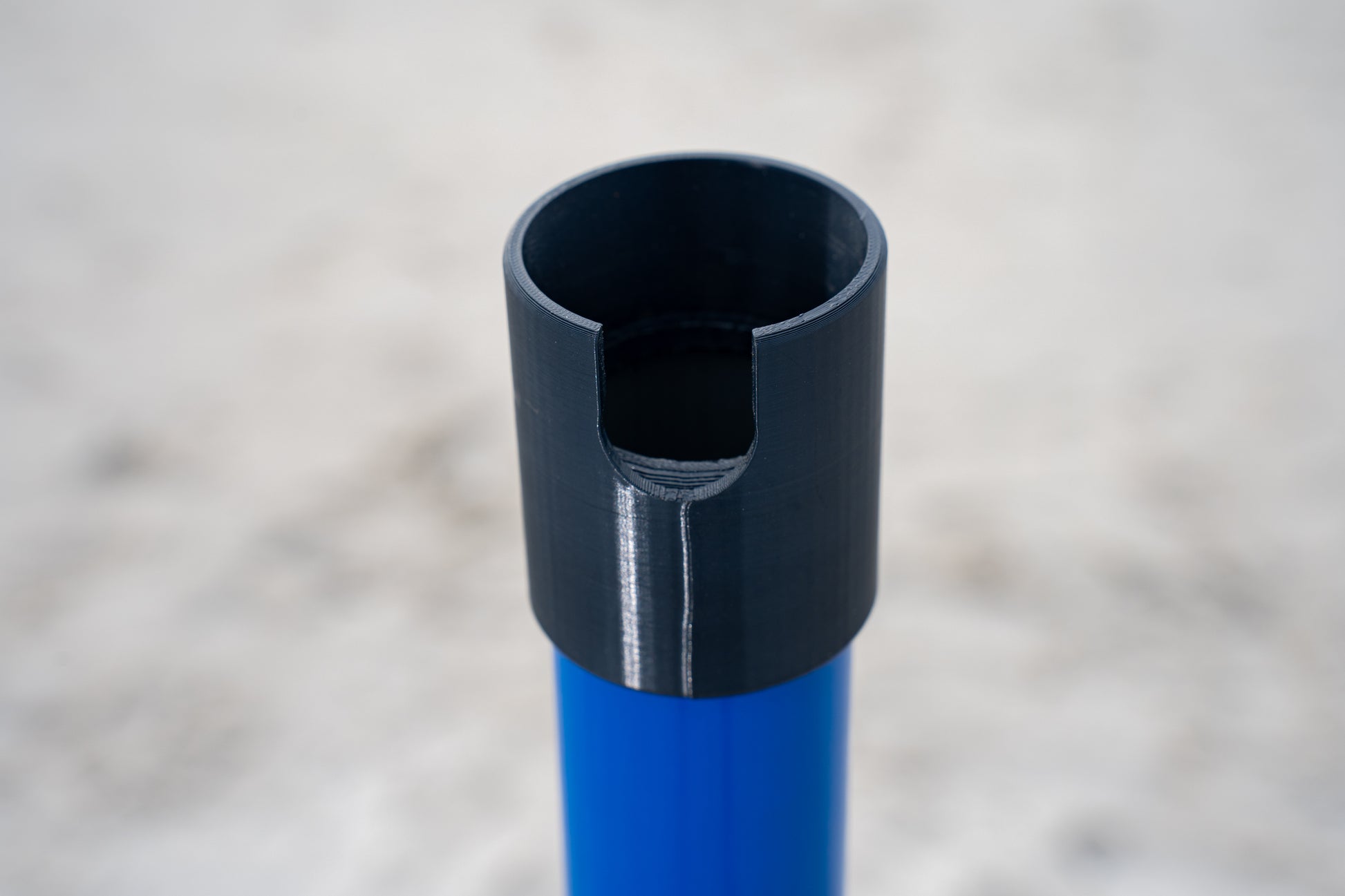 Custom blue aluminum surf fishing rod holder beach spike black 3d printed cap close up