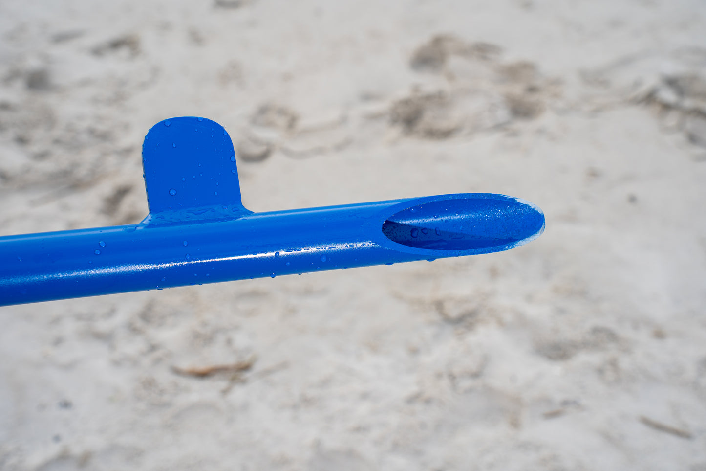 Custom blue aluminum surf fishing rod holder beach spike stabilizer near bottom