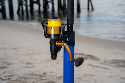 Custom white aluminum surf fishing rod holder beach spike close up with fishing rod