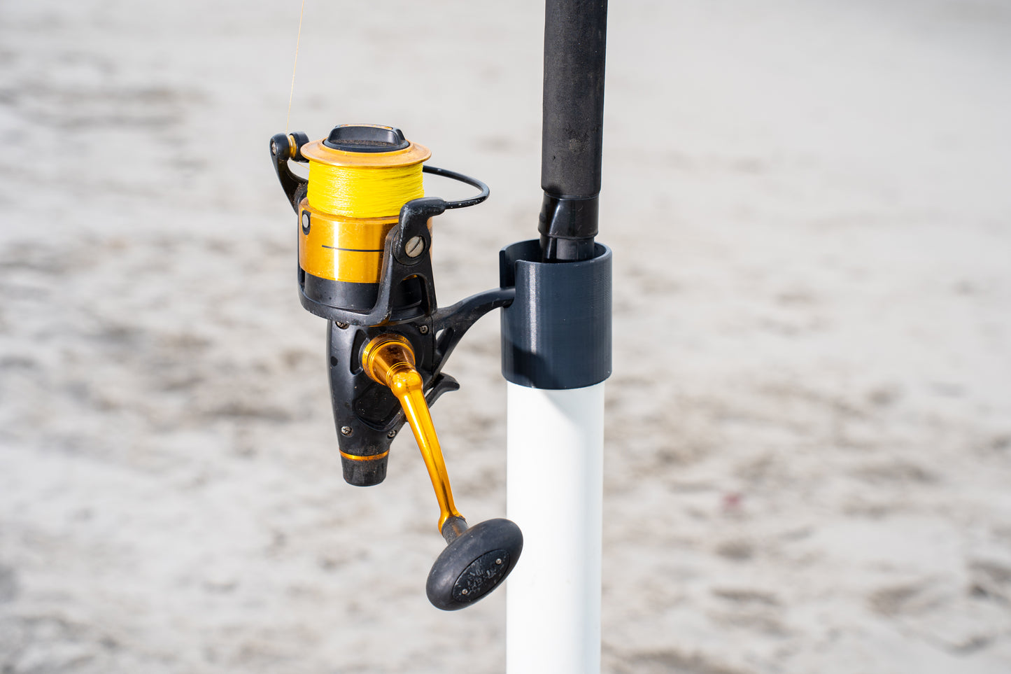 Custom white aluminum surf fishing rod holder beach spike close up