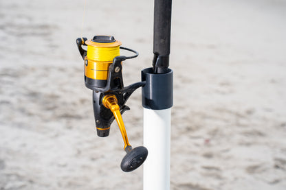 Custom white aluminum surf fishing rod holder beach spike close up