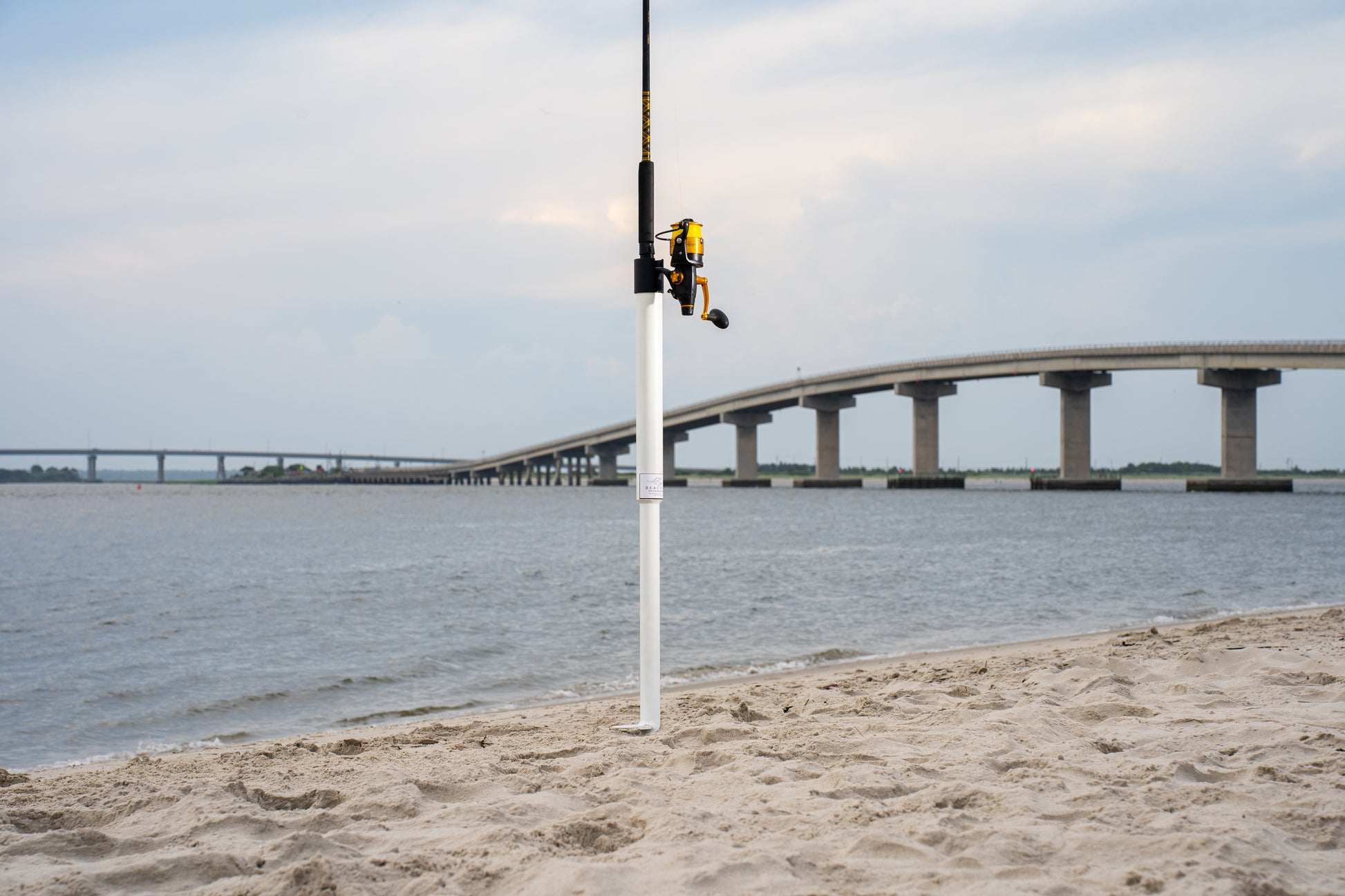 Custom white aluminum surf fishing rod holder beach spike in sand full size
