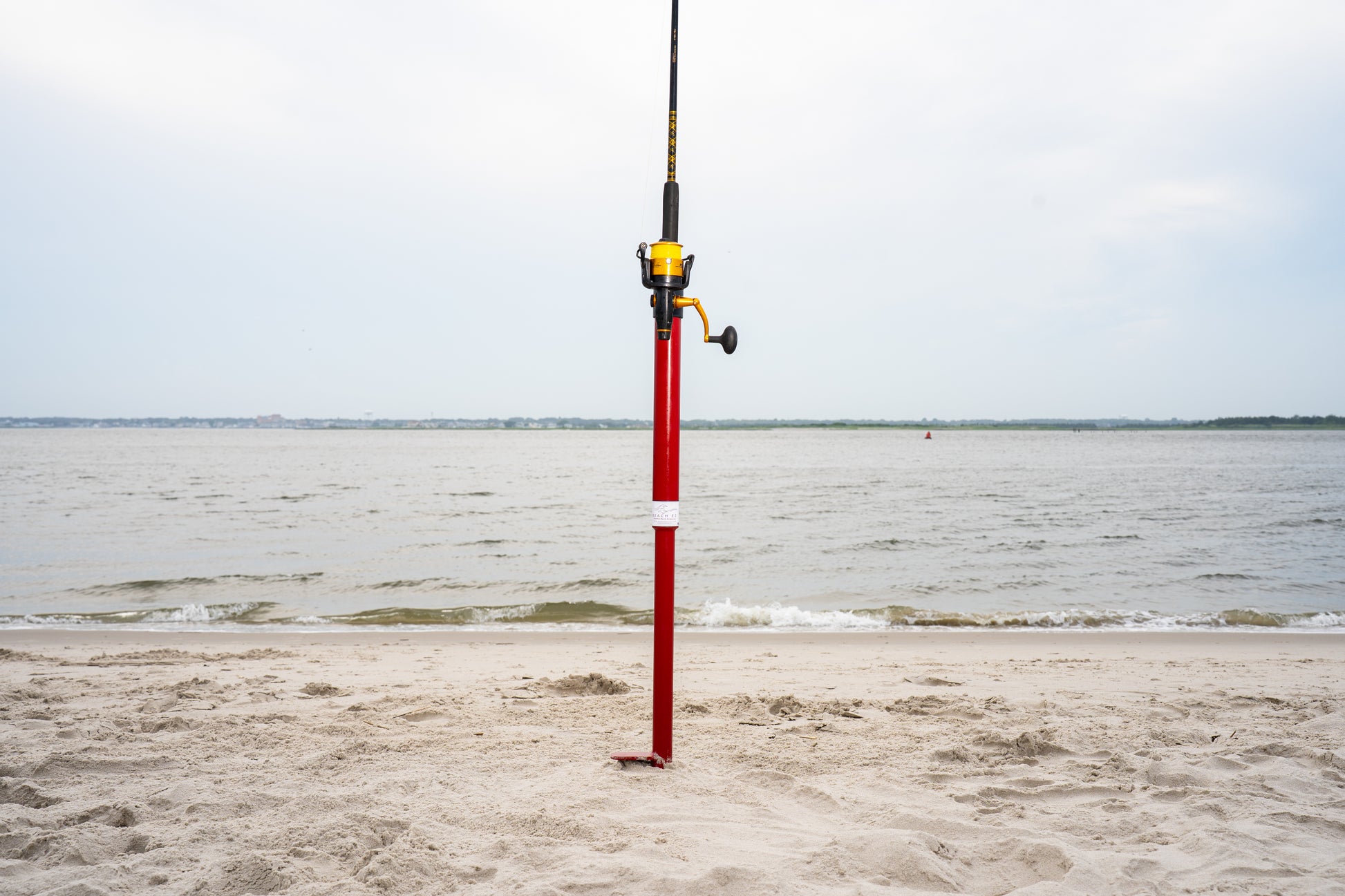 Custom red aluminum surf fishing rod holder beach spike in sand